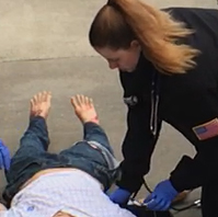 EMT Student with Patient on Ground