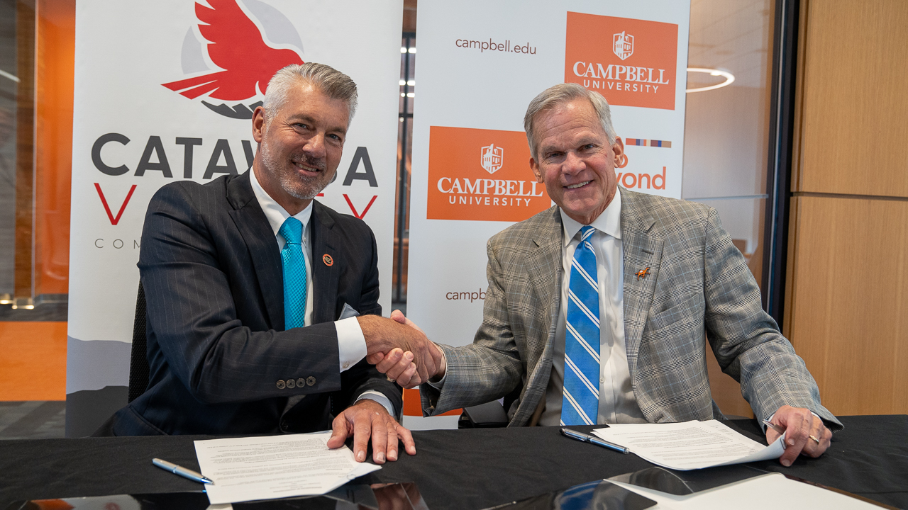 Dr. Garrett Hinshaw and Campbell president at Memorandum Agreement signing